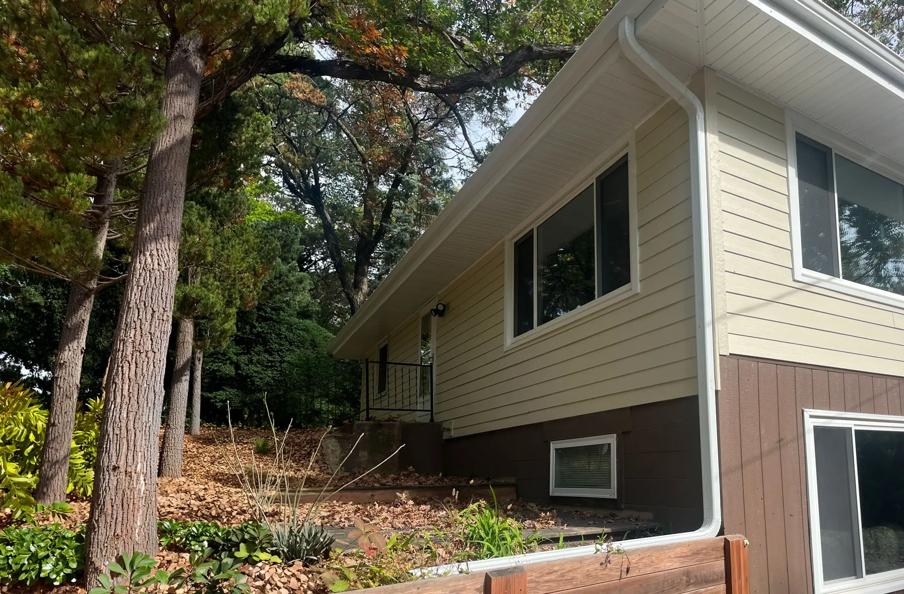 Seamless gutter and downspout on a garage