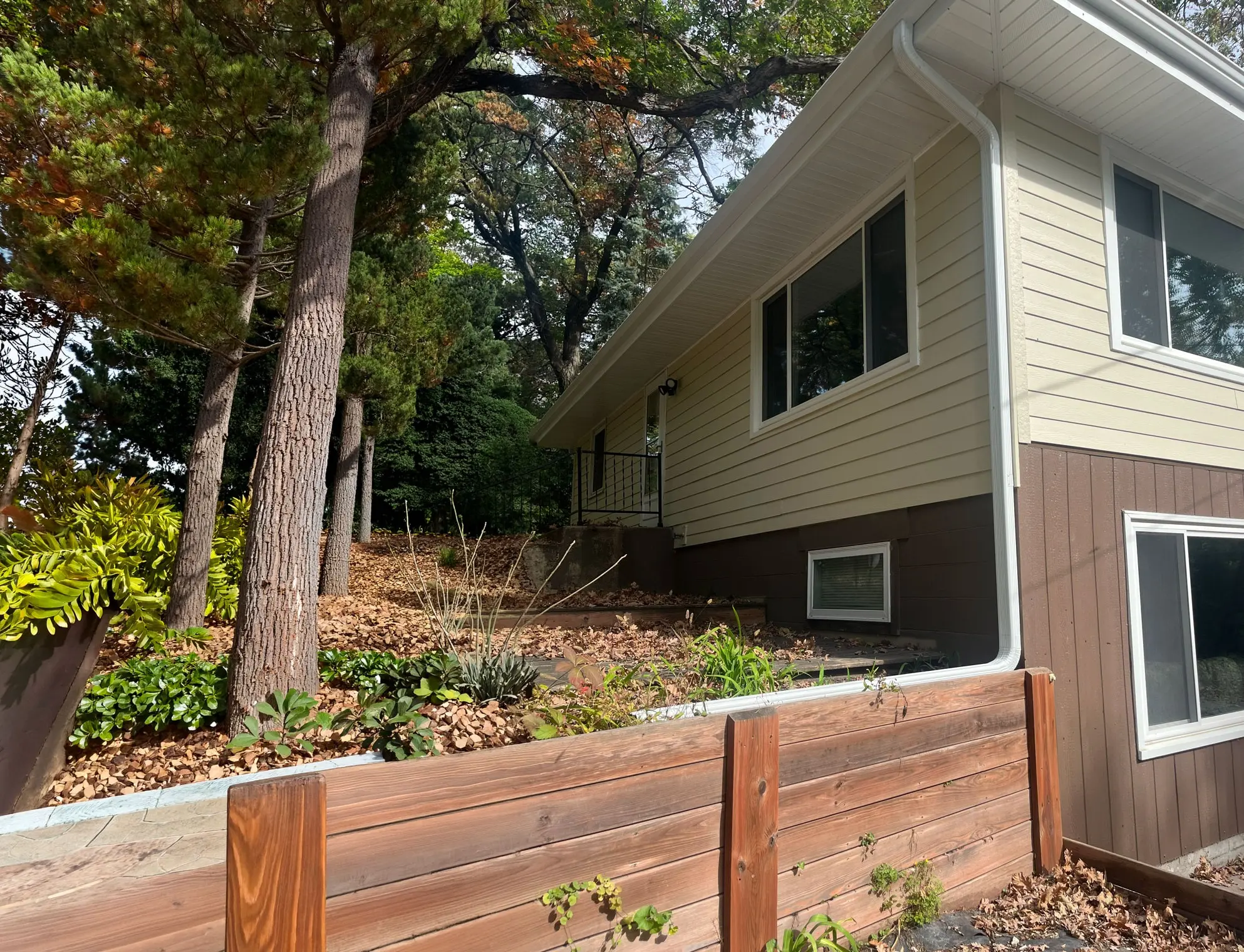 Seamless gutter and downspout on a garage