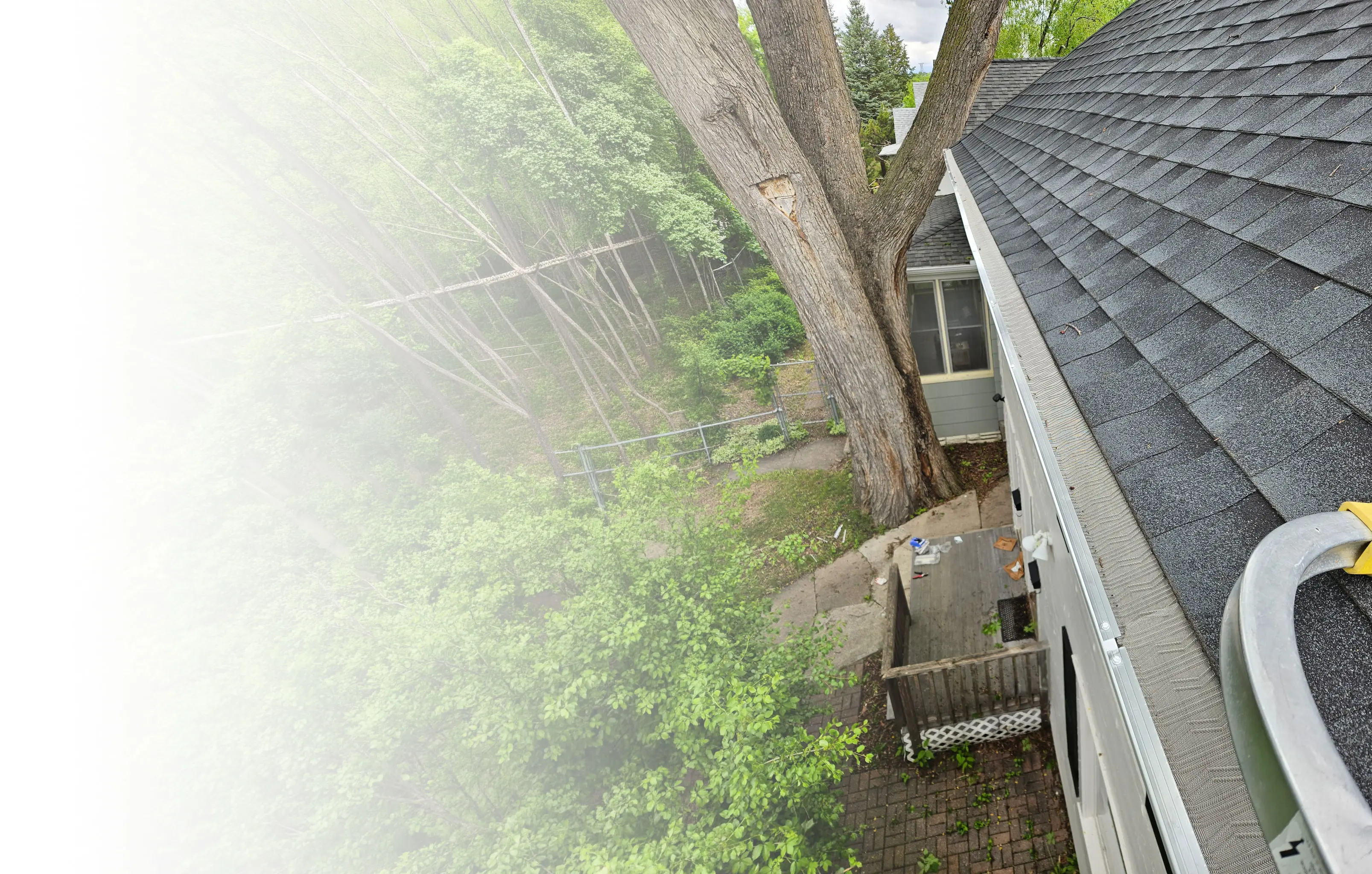 Gutter technician installing a seamless gutter section