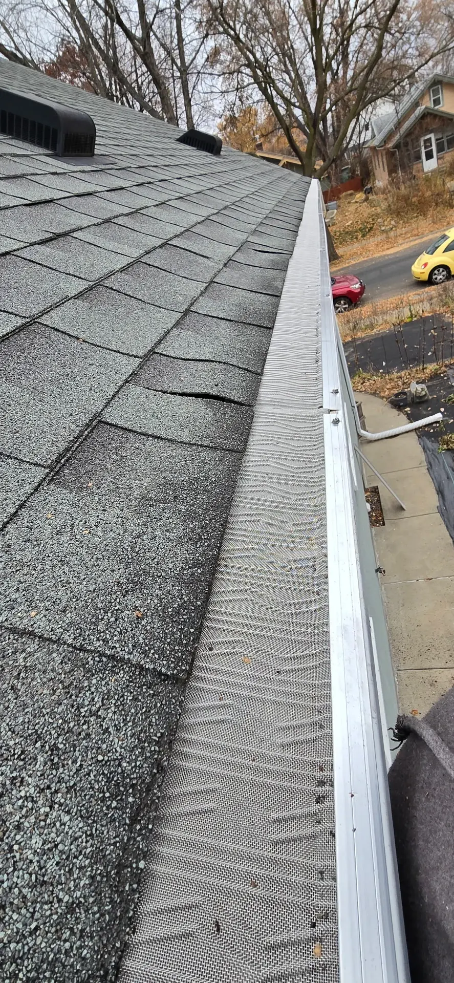 LeafBlaster Pro gutter guard installed along a seamless gutter on a Minneapolis home